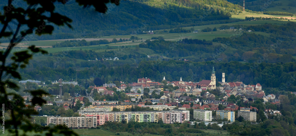 Bystrzyca Kłodzka, a view of the city situated in a mountain valley.