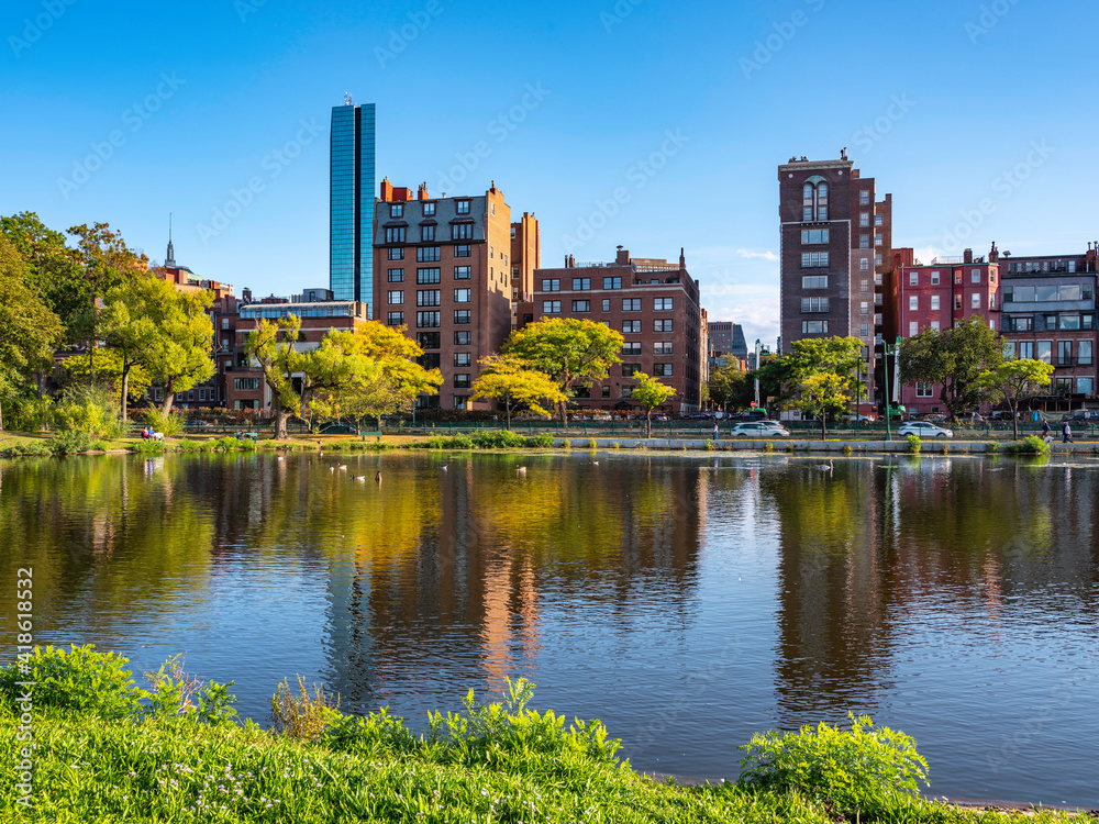Naklejka premium Boston City Skyline with Residential Buildings over Storrow Lagoon of Charles River