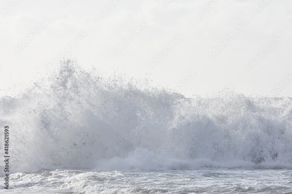 The sea demonstrating its power against the cliffs The sea demonstrating its power against the cliffs
