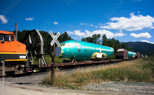 фотографія Airplane Fuselage on Railcar
