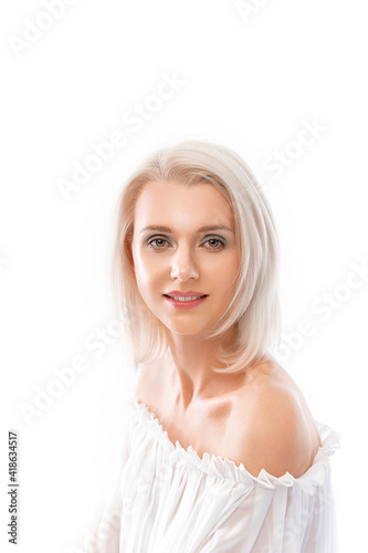 cute tender portrait of a beautiful young blonde woman with a cute smile on a white background