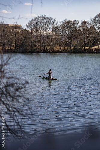 man on paddle board lady bird lake Austin texas