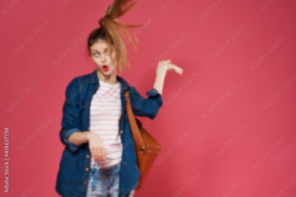 Pretty woman fashionable clothes studio backpack cropped view pink background Pretty woman fashionable clothes studio backpack cropped view pink background