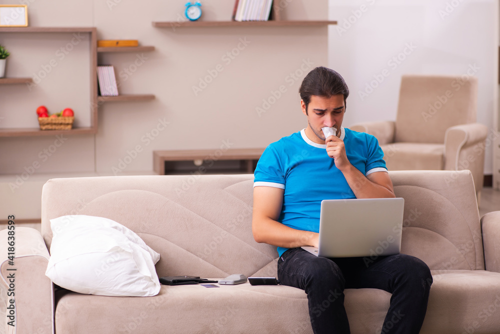 Sport bet addicted young man betting at home Sport bet addicted young man betting at home