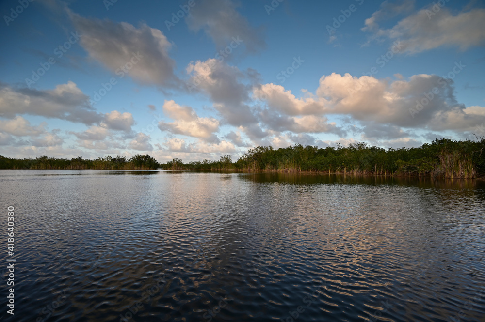 Nine Mile Pond afternoon cloudscape and reflections in Everglades National Park, Florida in winter. Nine Mile Pond afternoon cloudscape and reflections in Everglades National Park, Florida in winter.