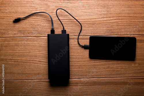 Power bank for charging mobile devices. Smartphone charger. External battery for mobile devices. © masyuk1989