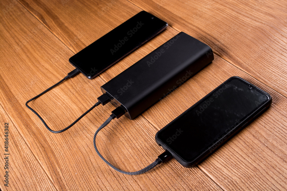 Power bank for charging mobile devices. Smartphone charger. External battery for mobile devices.