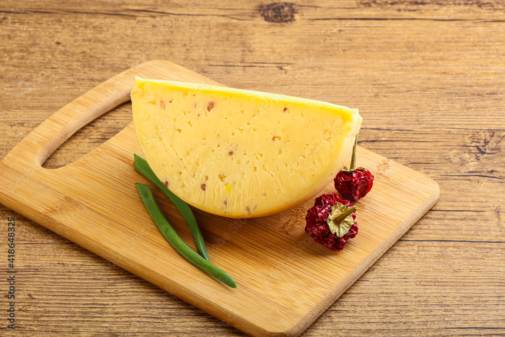 Hard cheese brick with walnut Hard cheese brick with walnut