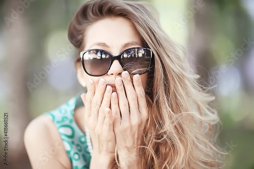 blonde summer city park walk beautiful / view beautiful young woman in urban environment outside concept vacation