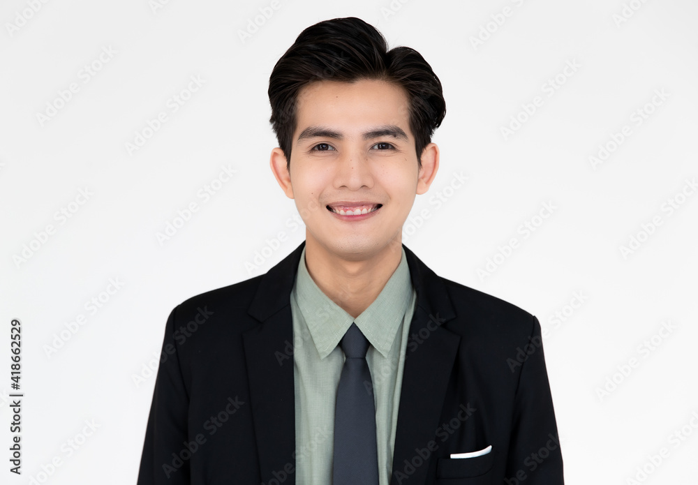Portrait of young and handsome Asian businessman in a black suit pose with smile face and self-confidence to camera isolated on white background Portrait of young and handsome Asian businessman in a black suit pose with smile face and self-confidence to camera isolated on white background