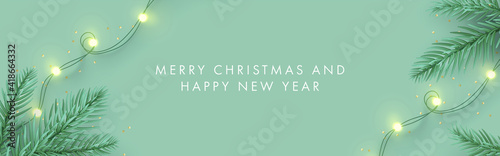 Merry Christmas and Happy New Year banner. Xmas background design with realistic pine tree branches and garland lights. Horizontal poster, greeting card, header for website in modern minimalist style