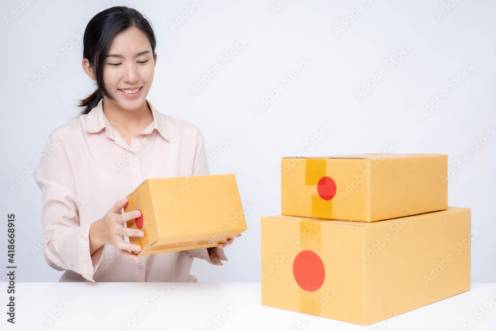 Asia woman Start up for Business Online. People with online shopping SME entrepreneur or freelance working concept. Banner size Asia woman Start up for Business Online. People with online shopping SME entrepreneur or freelance working concept. Banner size