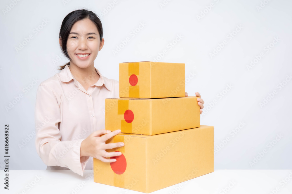 Asia woman Start up for Business Online. People with online shopping SME entrepreneur or freelance working concept. Banner size Asia woman Start up for Business Online. People with online shopping SME entrepreneur or freelance working concept. Banner size