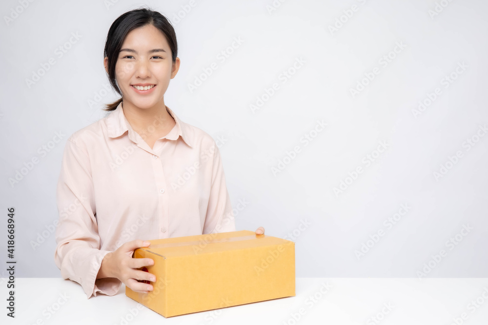Asia woman Start up for Business Online. People with online shopping SME entrepreneur or freelance working concept. Banner size Asia woman Start up for Business Online. People with online shopping SME entrepreneur or freelance working concept. Banner size