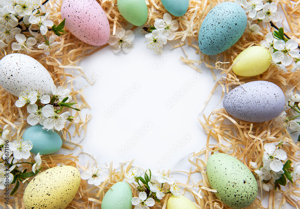 Colorful Easter eggs with spring blossom flowers Colorful Easter eggs with spring blossom flowers