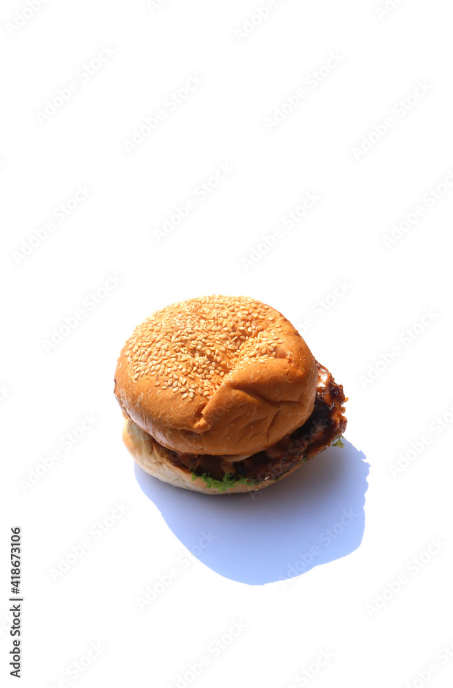 A burger on a white background A burger on a white background