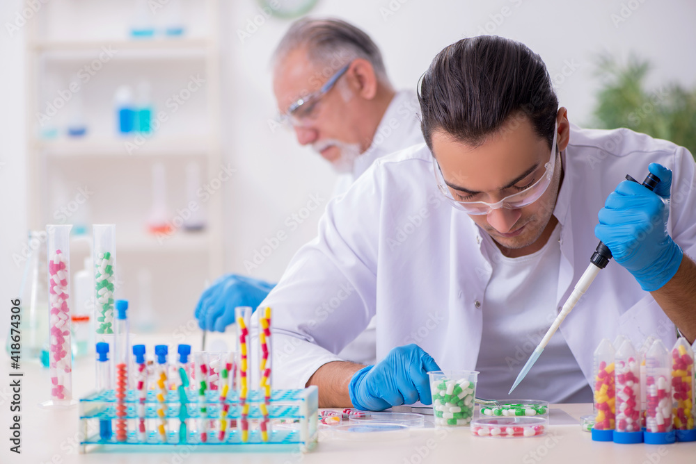 Two chemists working in the lab
