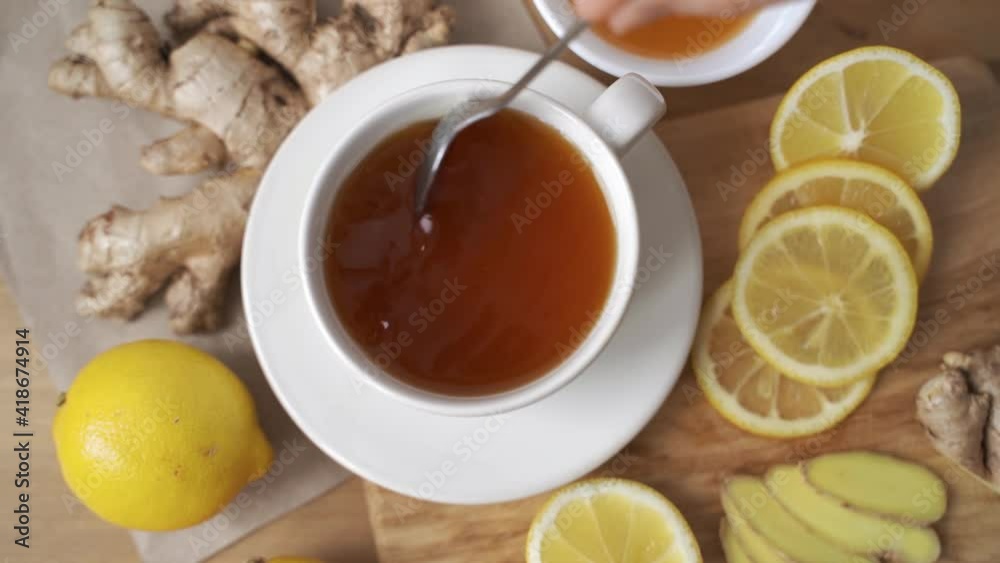Ginger, honey, lemon and lime herbal tea preparation with high levels of Vitamin C, boosting the immune system. Ginger, honey, lemon and lime herbal tea preparation with high levels of Vitamin C, boosting the immune system.