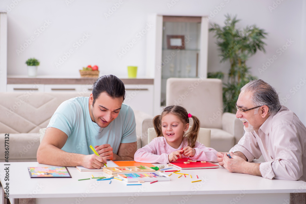 Three generations of family in early development concept Three generations of family in early development concept