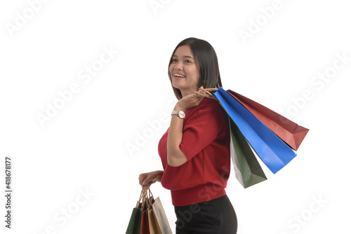 Young Asian women is shopping happily, on a white background.