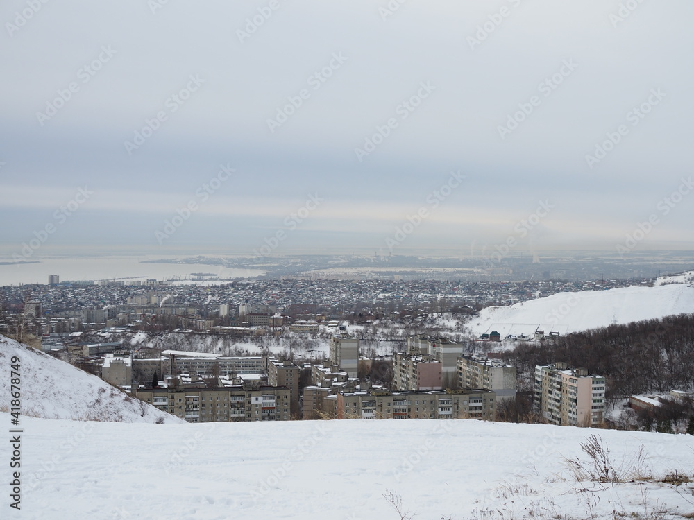 Winter landscape. The nature of Saratov, Russia in winter. Winter road to the city