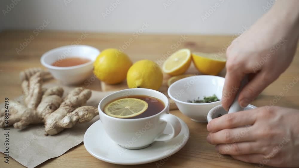 Cup of healthy tea with different kind of dryed herbs and flowers Cup of healthy tea with different kind of dryed herbs and flowers