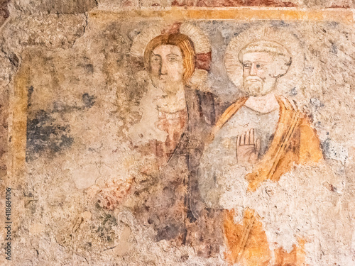 Close-up on ruins of religious ancient roman fresco