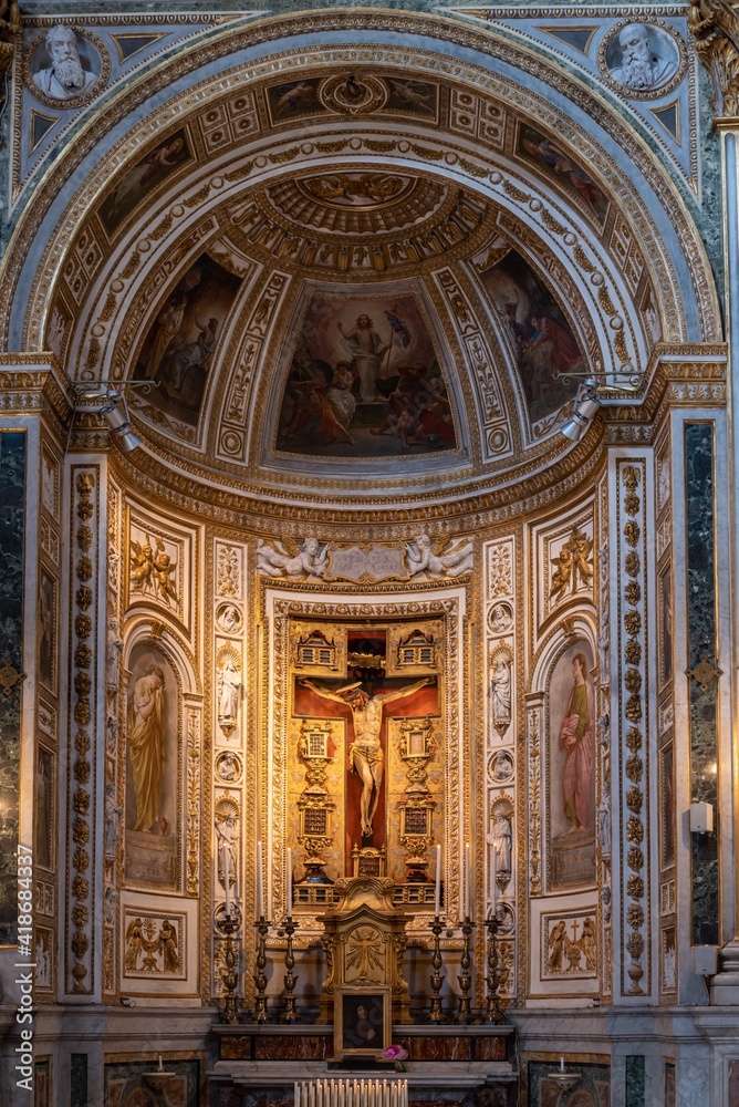 Detail of altar of chapel inside catholic church in Rome