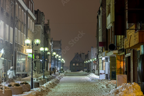 Fototapeta Naklejka Na Ścianę i Meble -  Olsztyn Old Town in winter at night - tenement houses in the Old Town