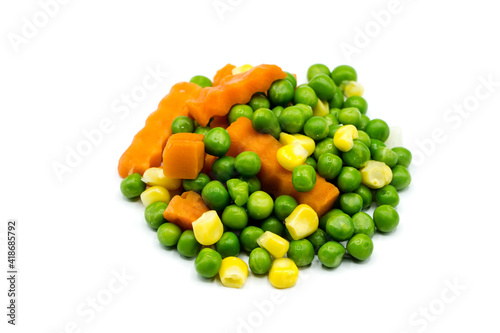 Peas carrots and corn isolated on white background