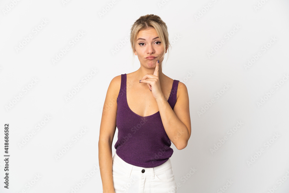 Young Russian woman isolated on white background and thinking Young Russian woman isolated on white background and thinking
