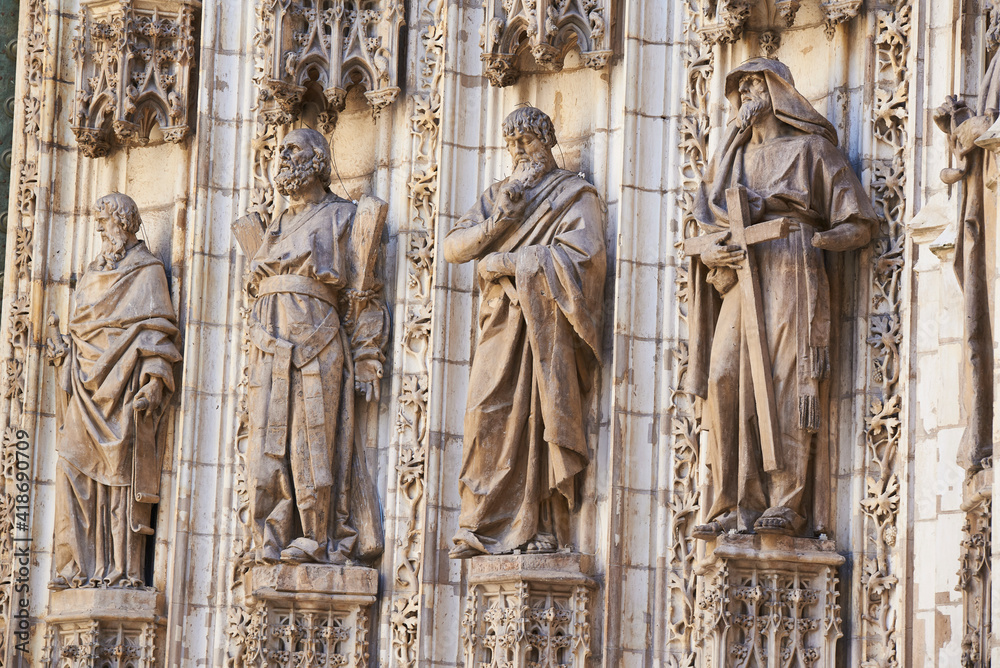 Religious sculptures on the facade of the Cathedral of Seville, Andalusia, Spain, Europe
