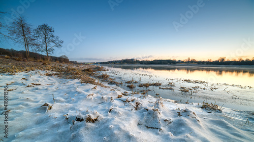 Amazing winter Kaunas lagoon Nemunas river. Sunrise colors.