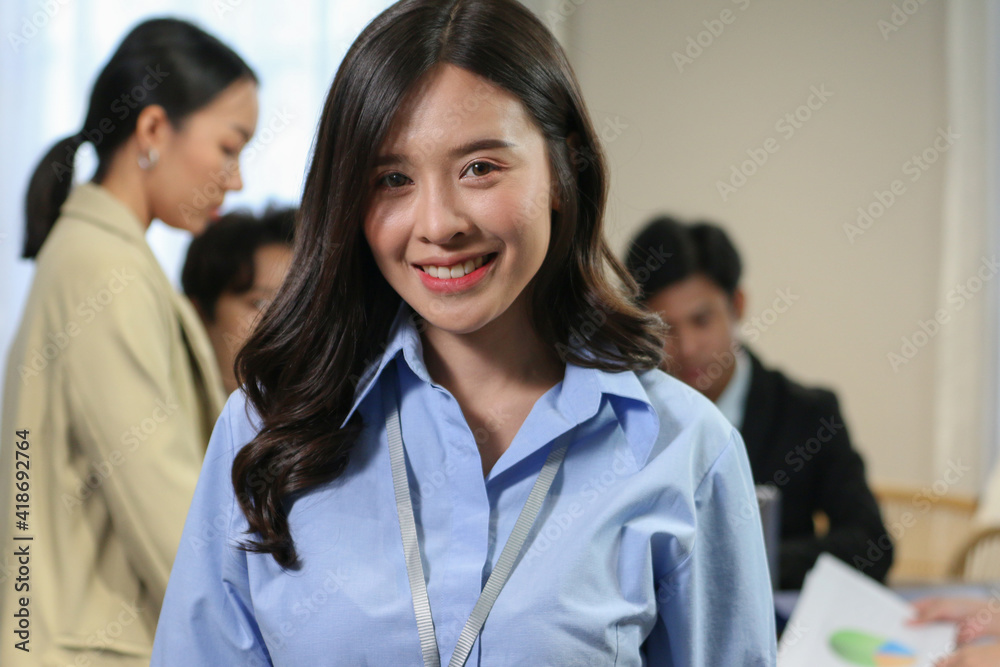 Portrait of Young business people talking and discussing with coworker team while group meeting in conference room Portrait of Young business people talking and discussing with coworker team while group meeting in conference room