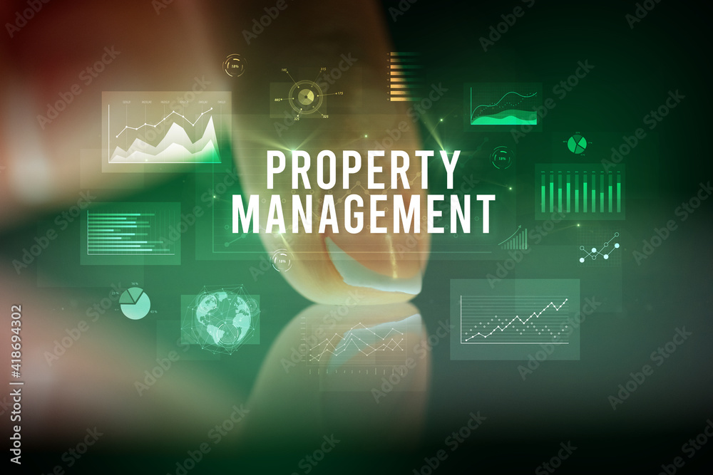 Finger touching tablet with charts and PROPERTY MANAGEMENT inscription, business concept Finger touching tablet with charts and PROPERTY MANAGEMENT inscription, business concept