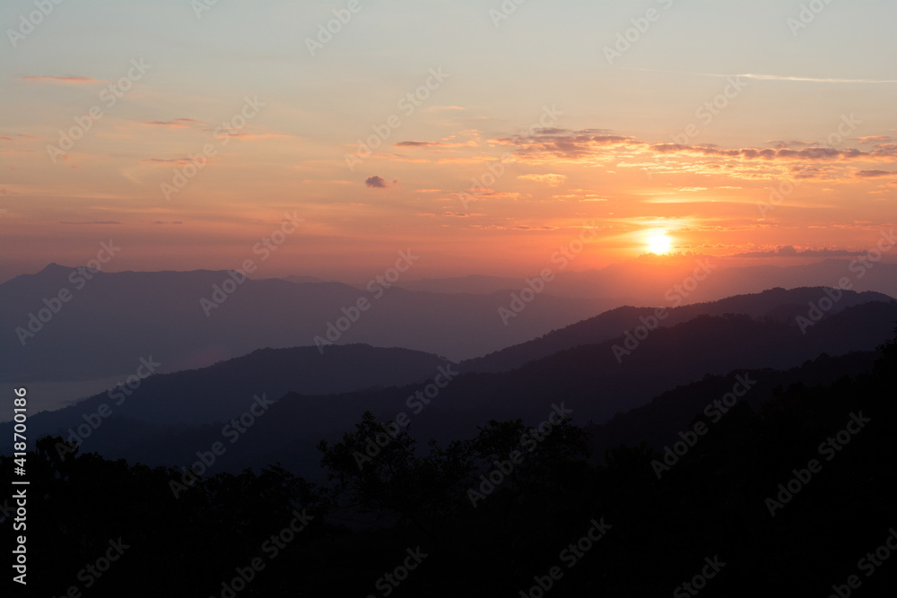 Beautiful sunset or sunrise sky on mountain hill. Background nature landscape view concept.
