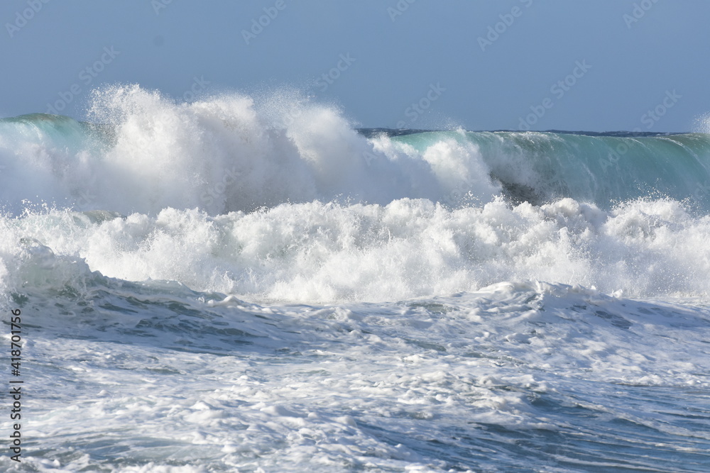 Watching the waves from the cliff