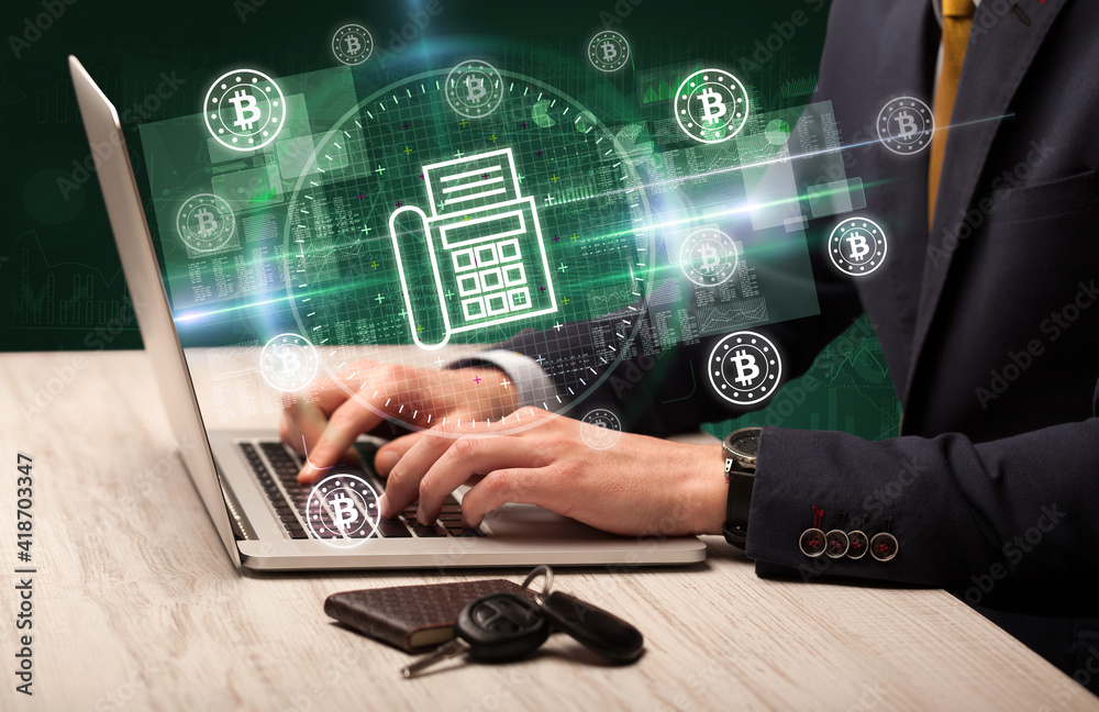 business hand working in stock market with fax icons coming out from laptop screen business hand working in stock market with fax icons coming out from laptop screen