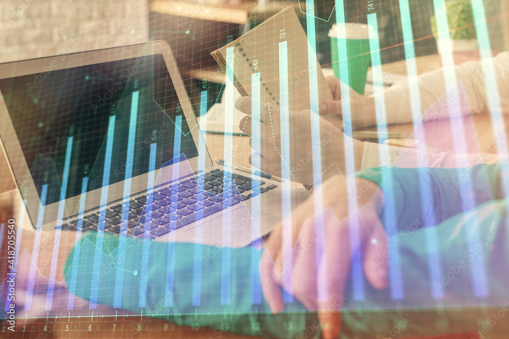 Double exposure of man and woman working together and forex chart hologram. Business concept. Computer background. Double exposure of man and woman working together and forex chart hologram. Business concept. Computer background.