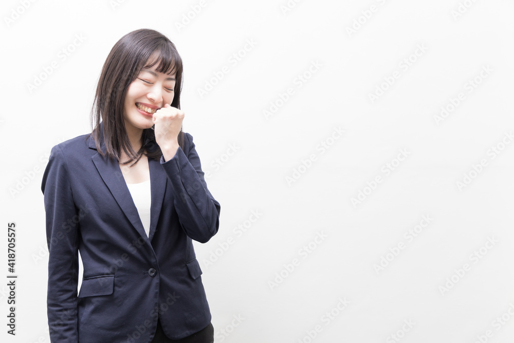 Woman raising her clenched fist (gesture) Woman raising her clenched fist (gesture)