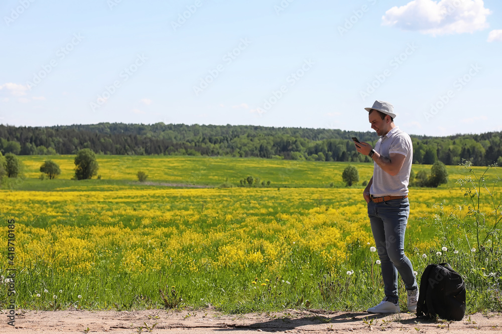 Young man travels with a backpack Young man travels with a backpack