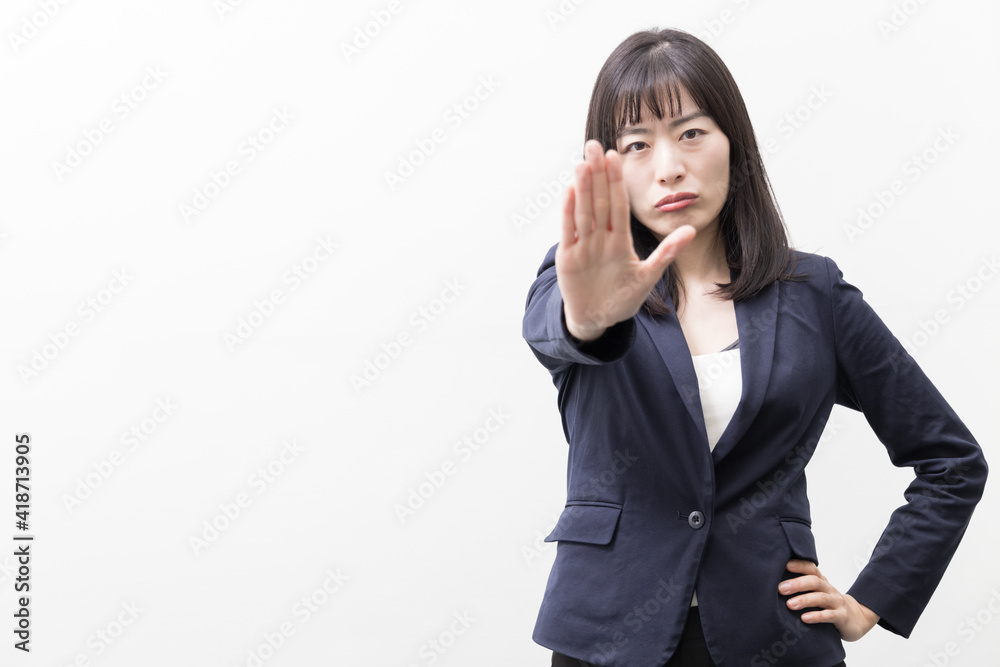 Woman sticking out the palm (gesture) Woman sticking out the palm (gesture)