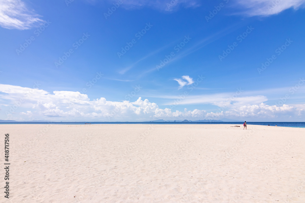 Beautiful white sand beach with blue sky and turquoise sea of Bamboo island or Koh Mai Pai. Phi Phi island National Park in Krabi, Thailand. Beautiful white sand beach with blue sky and turquoise sea of Bamboo island or Koh Mai Pai. Phi Phi island National Park in Krabi, Thailand.