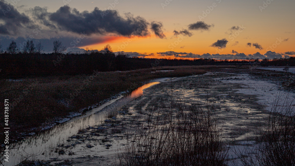 Beautiful sunset over a flooded field. 