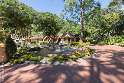 Panama Boquete, tropical gardens with fountain in Valle Escondido park panoramic view