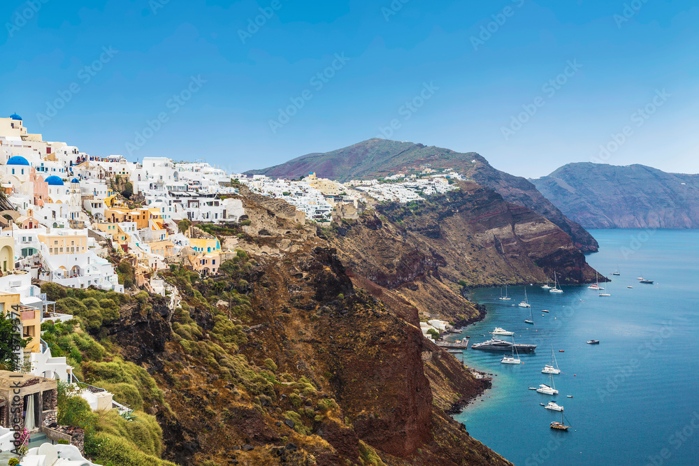 Panorama of the city of Oia on the island of Santorini. Top view. Greece