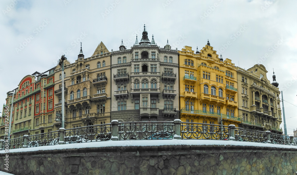 Beautiful colorful historical buildings on Masaryk embankment in Prague city center, Czech Republic
