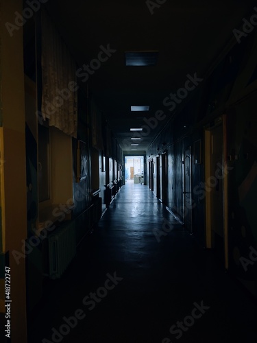 dark scary corridor and light at the end