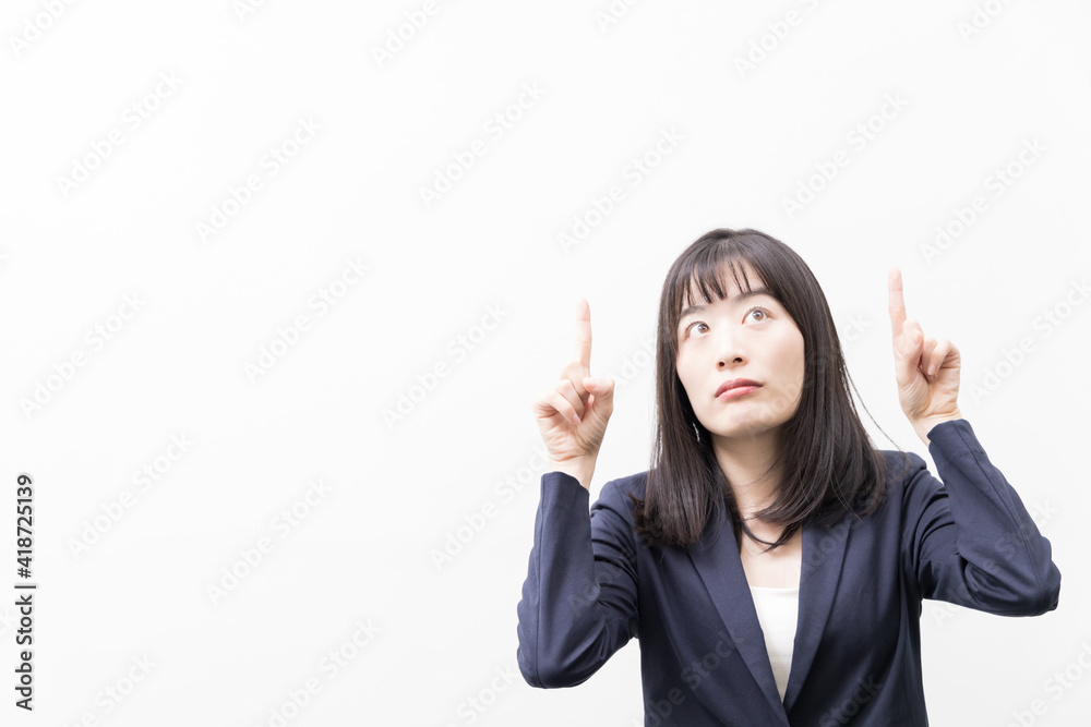Woman standing with her index finger up (gesture) Woman standing with her index finger up (gesture)