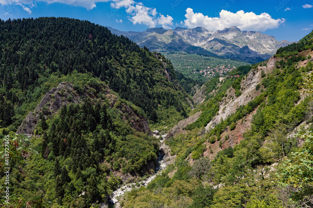 View of  the Tzoumerka Mountains and the traditional village of Theodoriana in Epirus, Greece